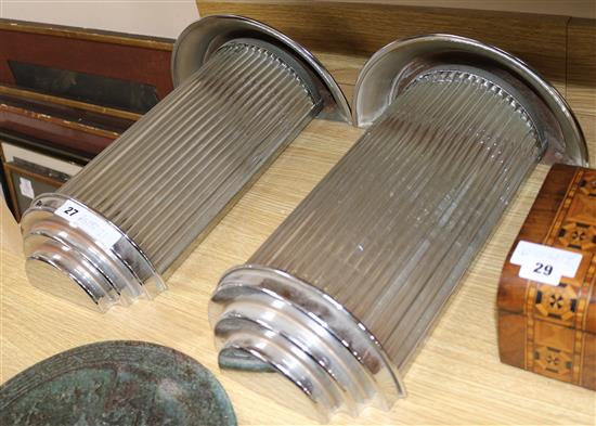 A pair of art deco chrome and glass rod wall lights. height 52cm